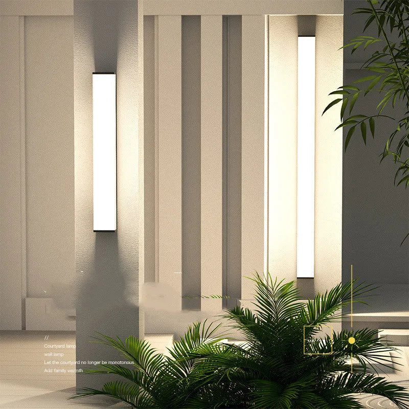 60cm long stainless steel outdoor wall light with IP65 waterproof rating for garden or courtyard.