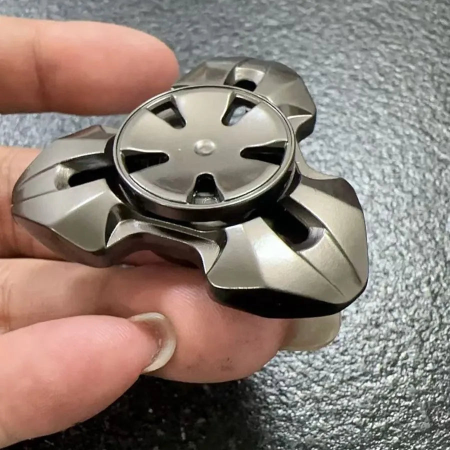 Alloy rotating fingertip gyro decompression toy in gun colour and colourful options for adult stress relief
