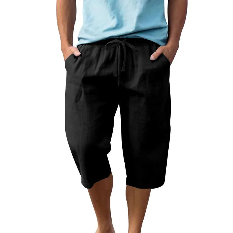 Men's loose fit linen shorts in light blue colour with a high waist and drawstring.