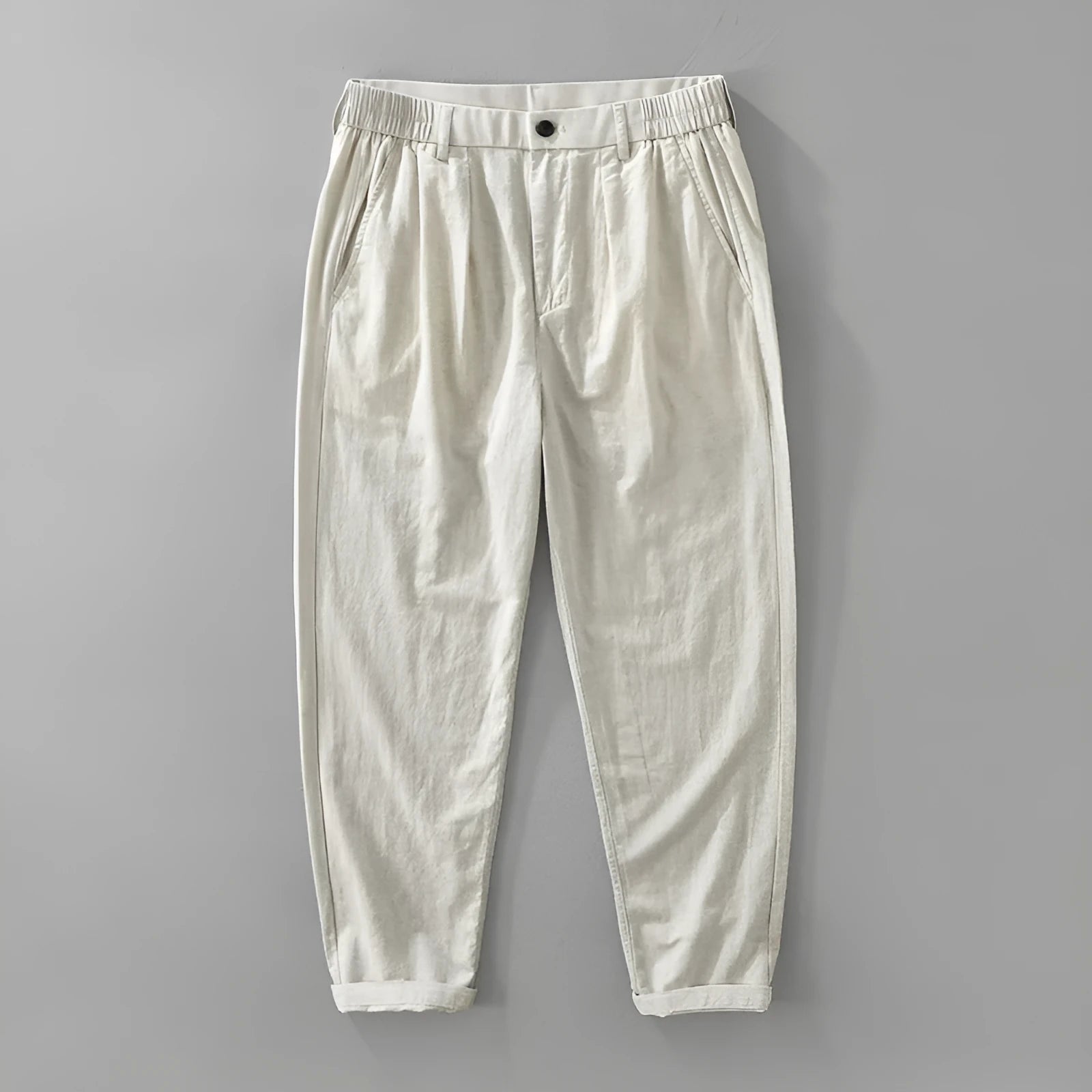 Men's loose straight-leg cotton linen trousers in brown displayed flat
