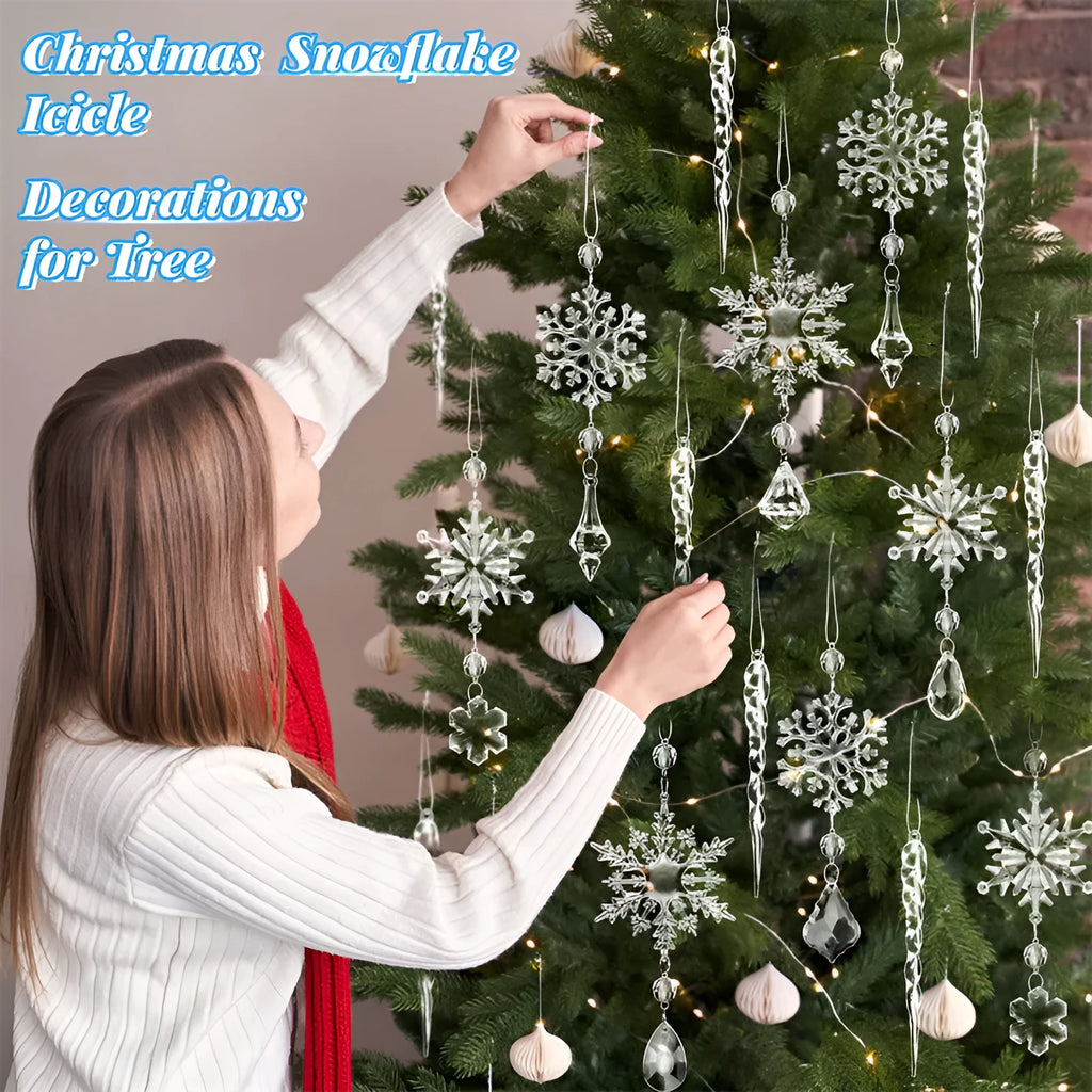 Ten clear transparent acrylic ice cone Christmas tree ornaments with white ribbons on green branches.