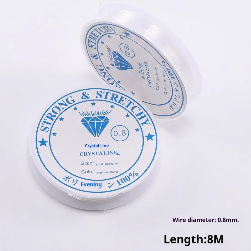 Roll of transparent white elastic fishing line for DIY jewellery making and craft.