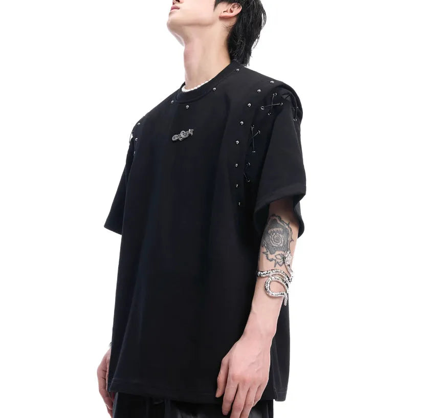 Deconstruction style short sleeve T-shirt with lace-up sides and cutout details in black or white.