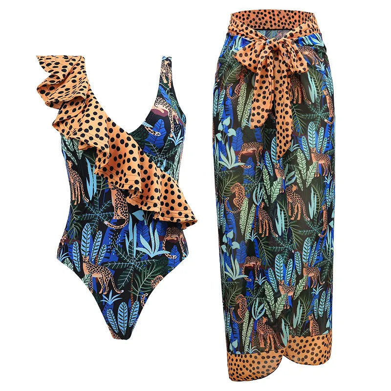 Solid colour women's one-piece swimsuit with thin spaghetti straps and a removable wrap skirt.