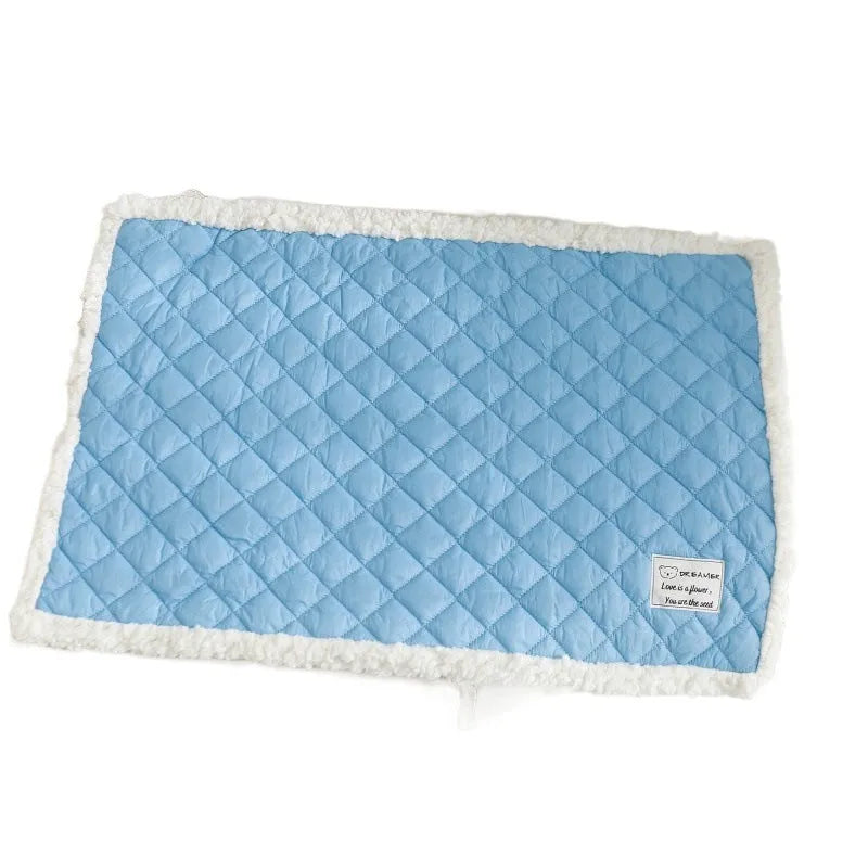 Quilted blue cloth pet blanket for cats shown in a large 80x60cm size.