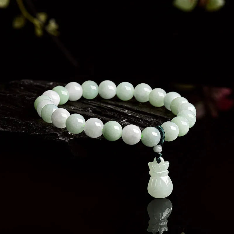 Jade flower bracelet with 8mm diameter floral centrepiece and adjustable unisex fastening