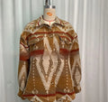 Women's retro woolen jacket with Aztec print in army green colour showing loose fit and long sleeves