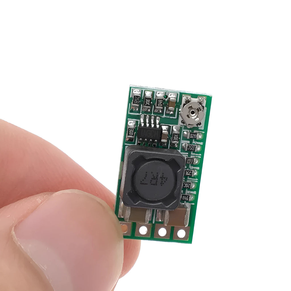 Green circuit board DC-DC power module converting 12-24V to 5V with 3A output capacity