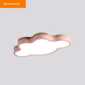 Modern cloud-shaped LED ceiling light in a wooden finish, shown in pink, mounted on a ceiling.