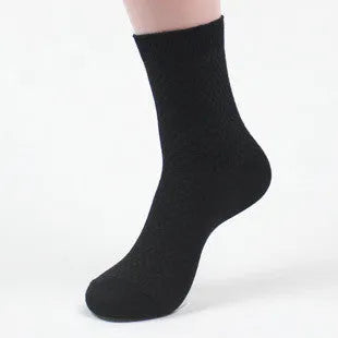 A pair of men's bamboo fibre socks in a classic colour, showing the small square pattern and medium thickness.