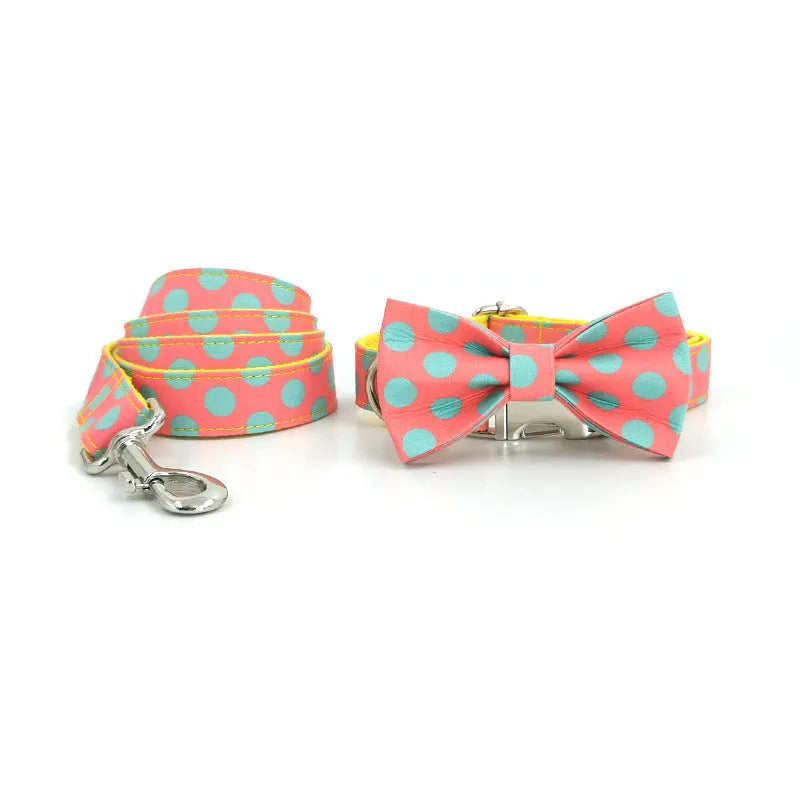 Yellow polka dot dog collar and matching lead rope set with a decorative bow.