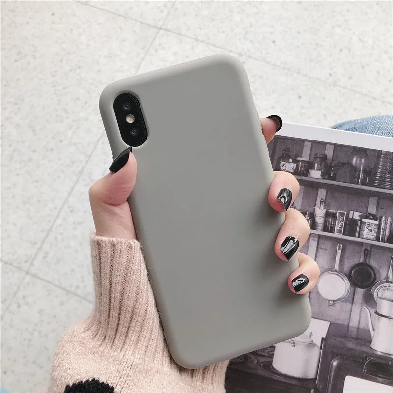 Silicone phone case for iPhone in wine red, light blue, grey, dark green, begonia, rose gold, bean green or black.