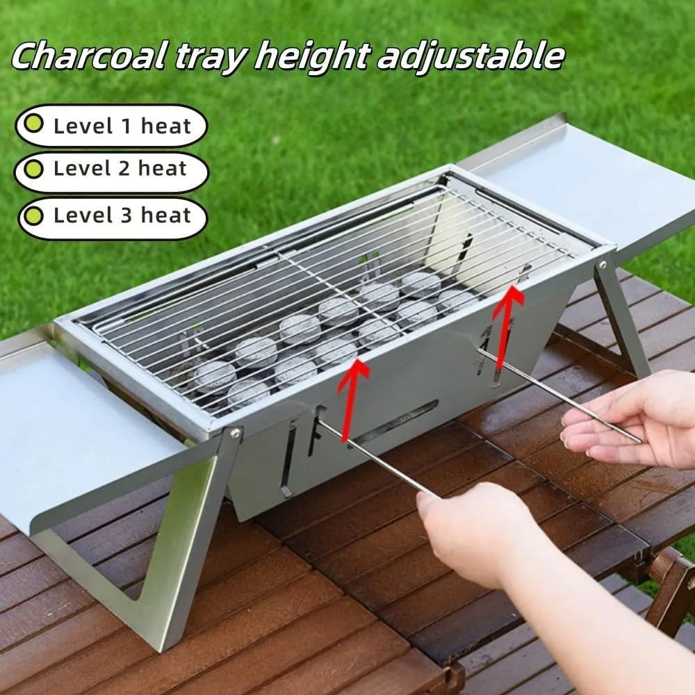 Small portable charcoal grill with foldable legs, shown collapsed for storage.