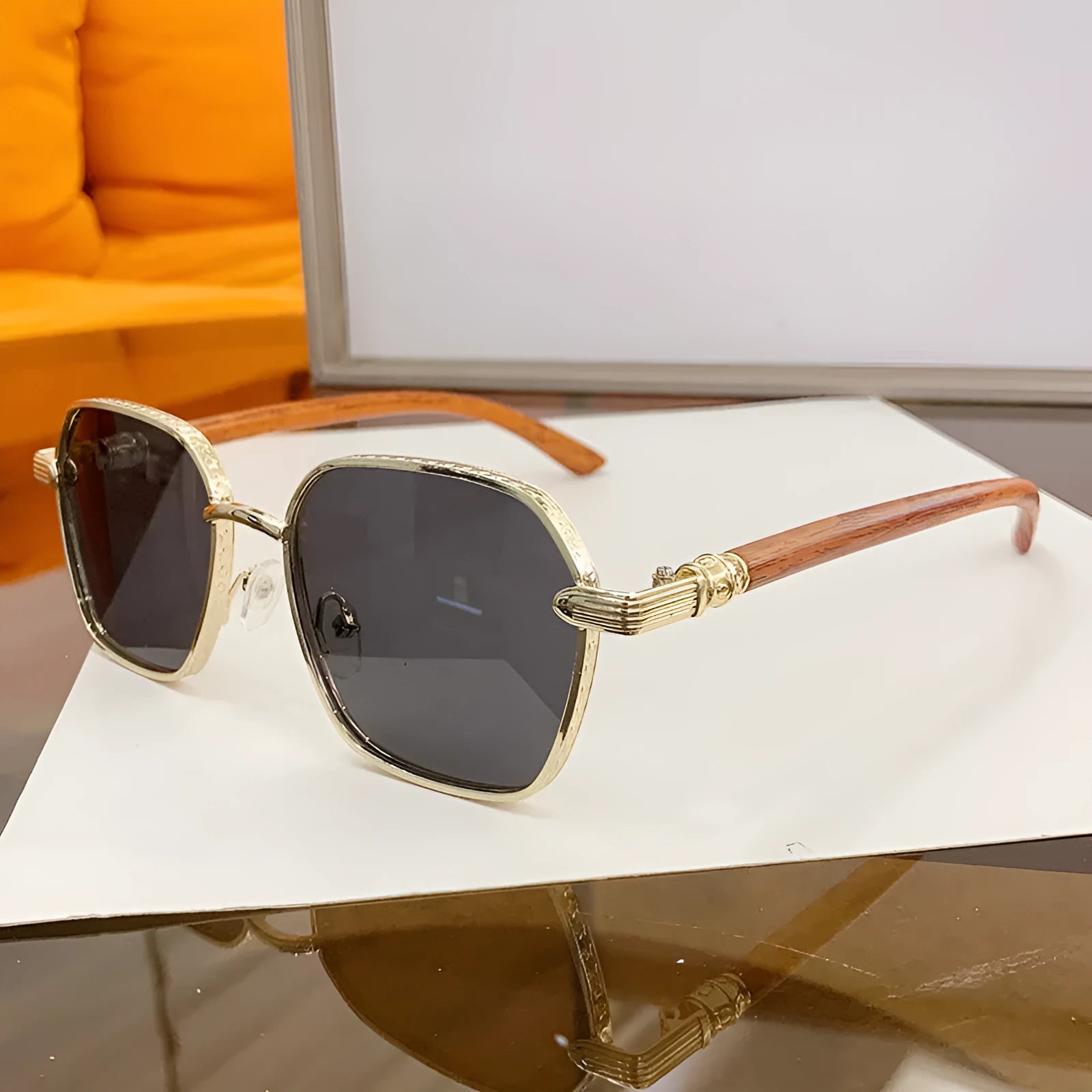 Women's fashion glasses with wood grain detailing on gold alloy frames