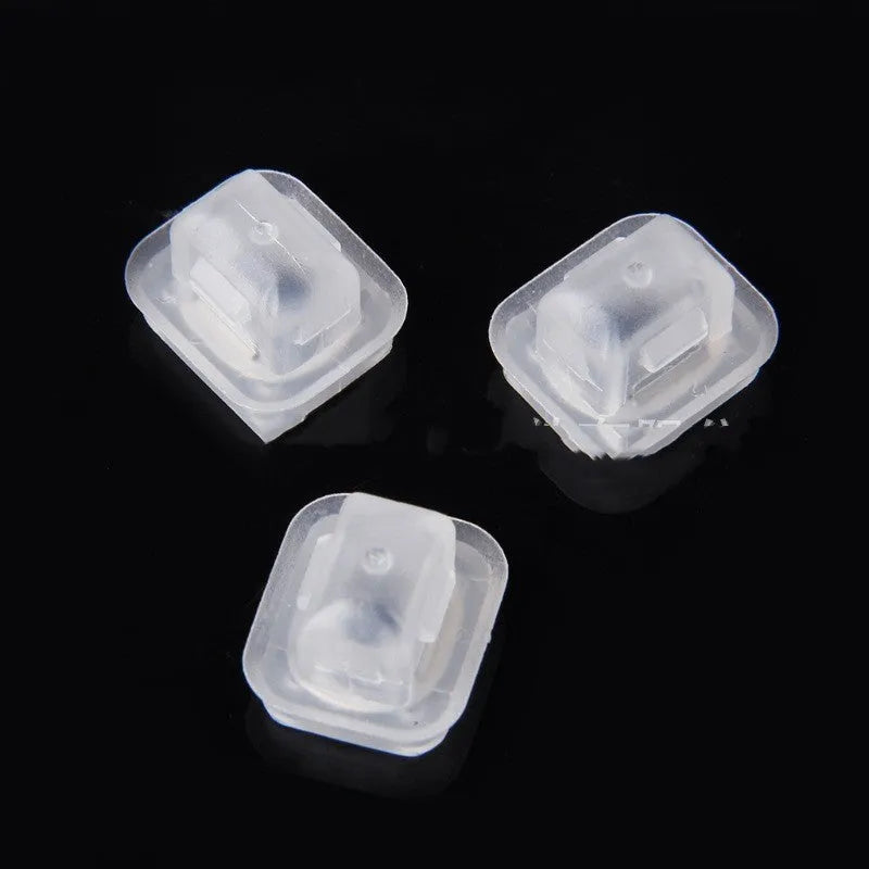 BMW E39 E38 interior trim fasteners with peach wood style finish and transparent plastic construction