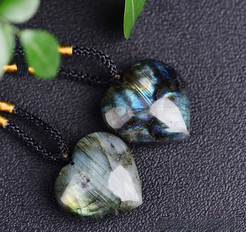 Blue light labradorite moonstone Heart of the Ocean geometric crystal necklace on a chain.