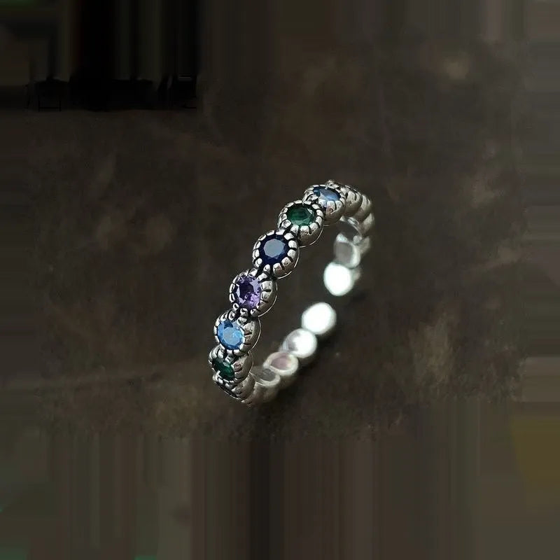 Round zircon ring with adjustable opening and retro silver finish