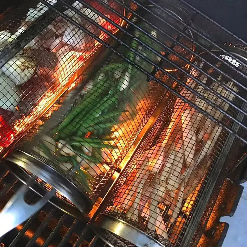 Stainless steel rolling barbecue grill basket with mesh cylinder for cooking vegetables and meatballs