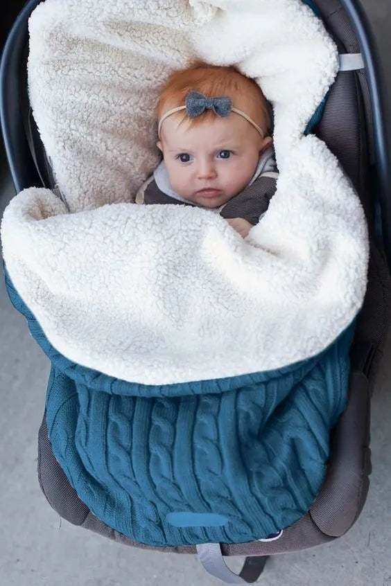 Envelope baby stroller sleeping bag in a plain colour with thick filling for winter.