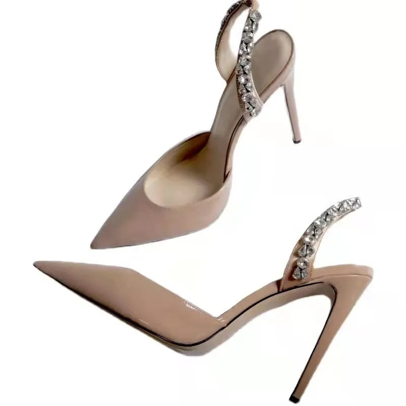 Women's black pointed toe high heel sandals with rhinestone side accents showing 11cm heel height