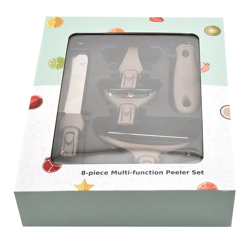 Brown eight-piece kitchen cutter set with peeler, knife and chopping board on wheat straw base
