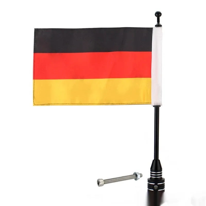 Motorcycle luggage rack flagpole accessory in black and silver finishes mounted on tail box
