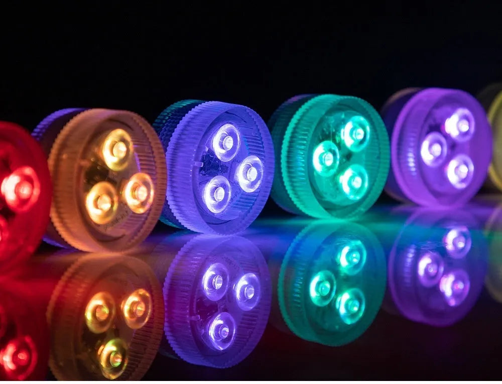 Remote control waterproof LED diving light for fish tank, showing compact plastic unit.