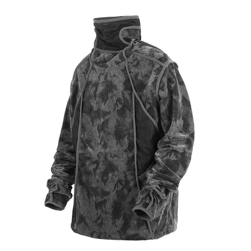 Man modelling a black and grey tie dye print loose fit pullover sweater with drop shoulders.