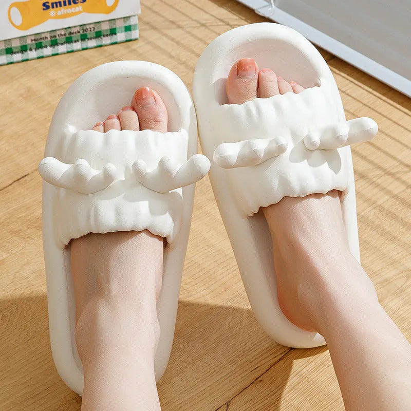 Women's Deer Horn design flip flop slippers in light yellow with hollow-out EVA upper and textured sole.