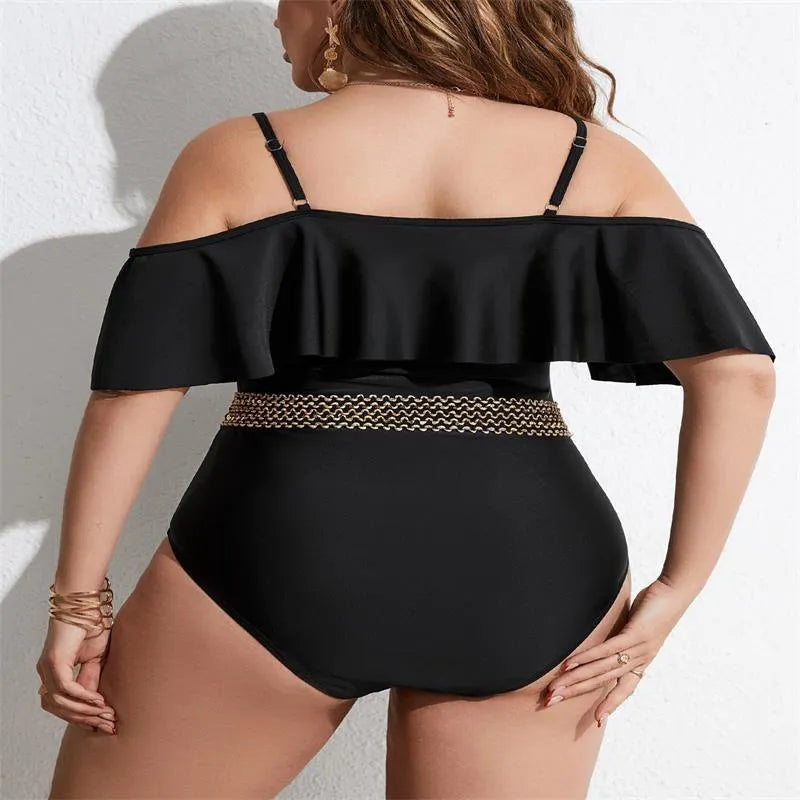 Black solid colour women's one-piece swimsuit on a hanger