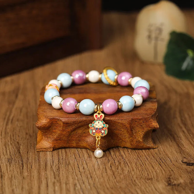 Gray ceramic bracelet with rabbit motif and porcelain glaze finish