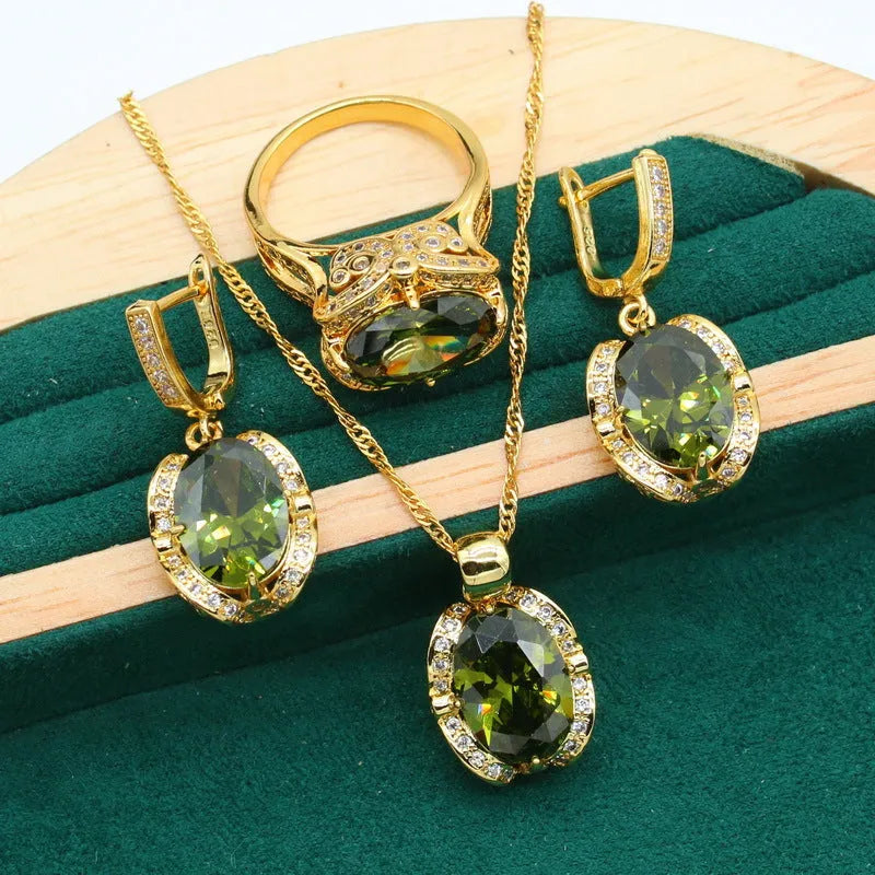 Women's copper zircon jewellery set with snake bone chain necklace, matching earrings and ring in olive green or red