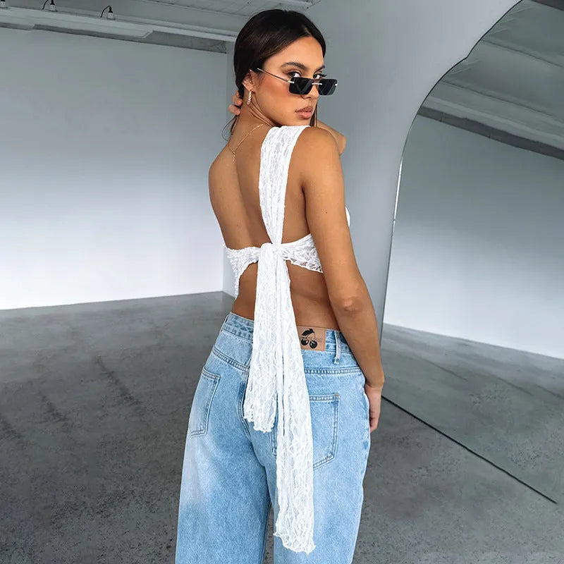 Women's sleeveless lace backless top with asymmetrical neckline in solid colour