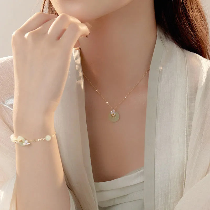 925 sterling silver orchid pendant necklace with a secure safety buckle on an O-link chain.