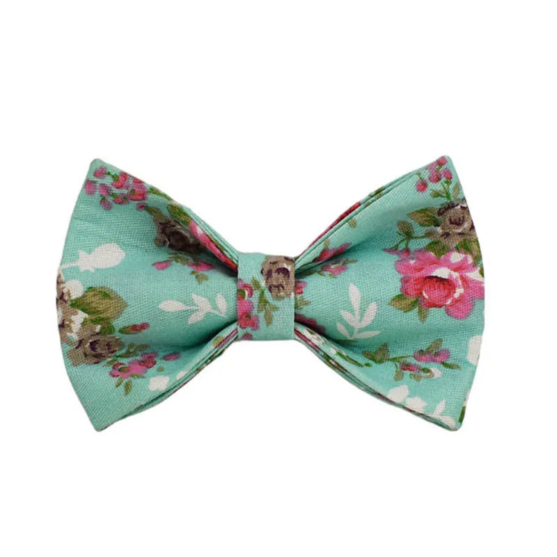 Rose floral pattern dog collar and leash set with green background, detachable bow, and matching dog vest