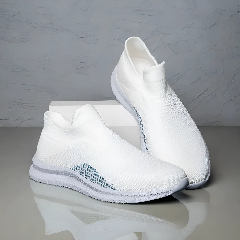 Men's white Popcorn Flyknit low-top casual sneaker on a solid background.