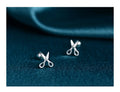 Pure silver screw-style ear nails for cartilage piercings with mini scissors design