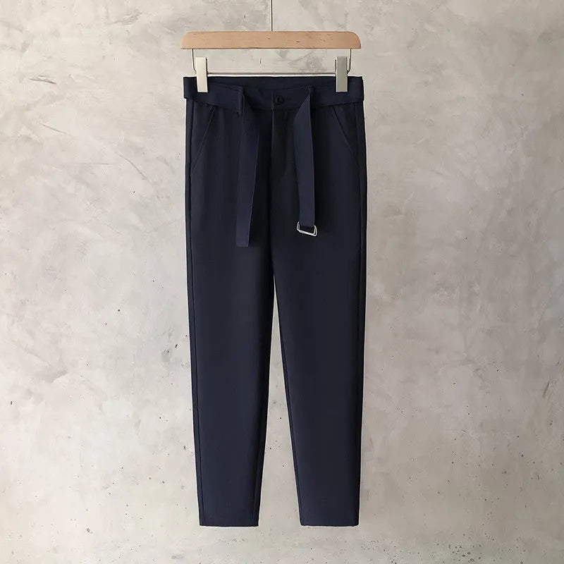 Boys slim straight wool trousers in tapered cut for business casual and street fashion.