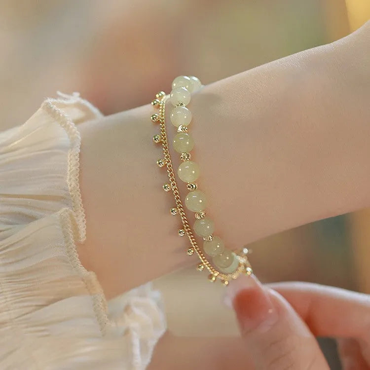 Natural Hetian Jade bracelet with Princess Running beaded design for women