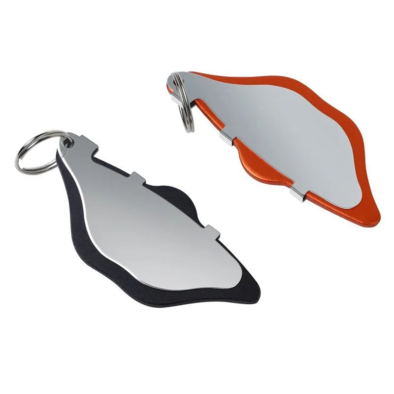 Mountain bike disc brake linings in black and orange with adjustment flap