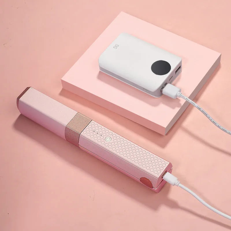 Pink and green cordless USB hair straightener with ceramic plates and digital temperature display