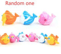 Plastic swimming turtle bath toy with brain game component for baby water play