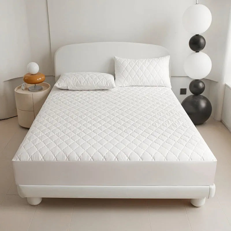 Diamond lattice quilted waterproof mattress protector fitted sheet set in solid colour.