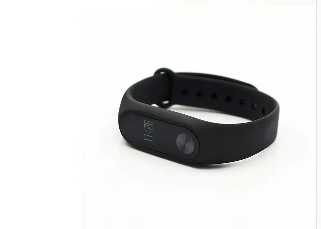 Xiaomi Mi Band 2 black smartband with OLED display on adjustable grey wrist strap.