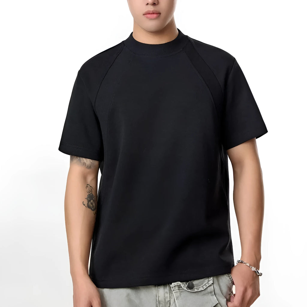 Loose short sleeve top with textured air layer stitching in black, grey, or white.