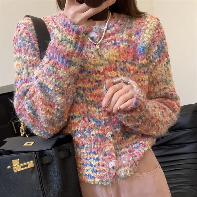 Rainbow pattern knitted cardigan in pink and green colours with toothbrush hair texture