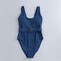 Navy blue women's one-piece slimming swimsuit with triangle neckline and removable chest pad.