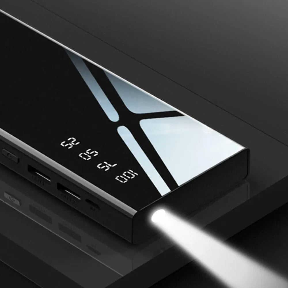 Black 20000mAh power bank with LCD display showing battery level and two USB ports