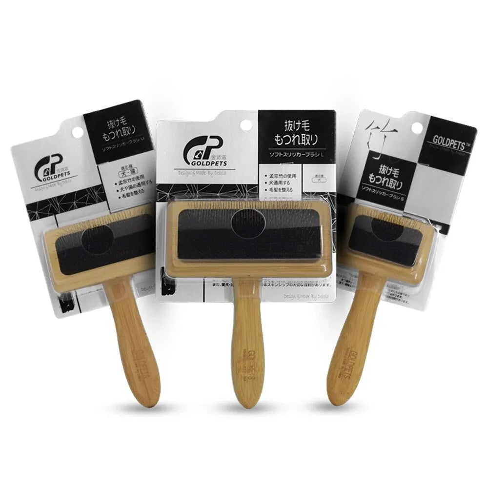 Goldpets bamboo wood slicker brush for pets with stainless steel pins on a wooden handle.
