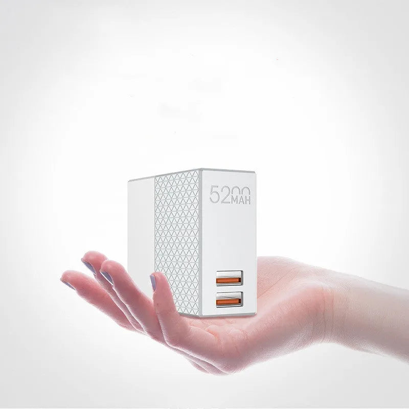 White two-in-one power bank charger with built-in plug, showing compact 71.5mm size.